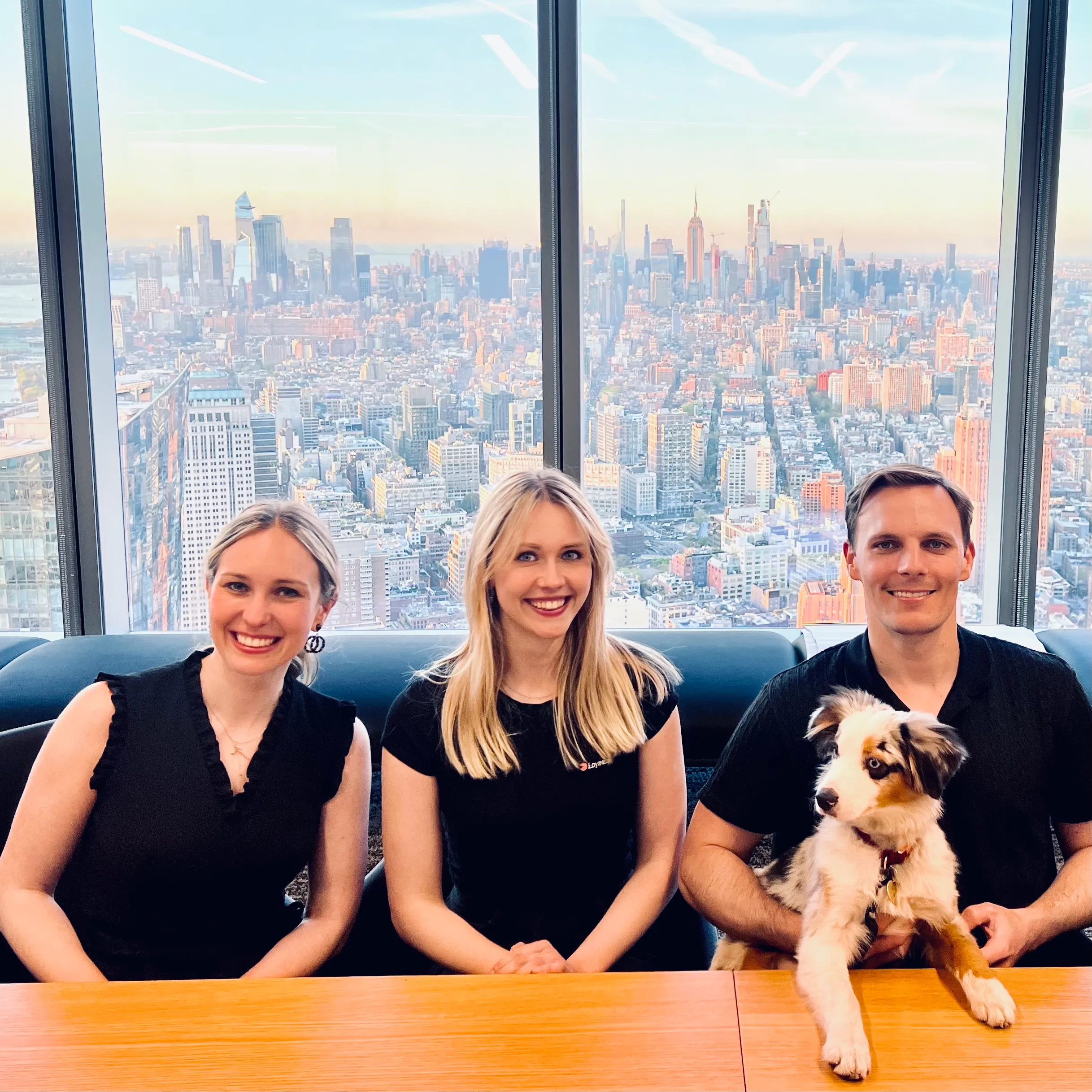 The Alfa founding team with the NYC skyline behind them