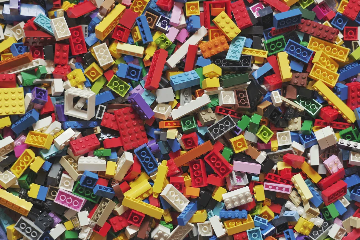 A large pile of colorful interlocking building blocks