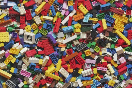 A large pile of colorful interlocking building blocks