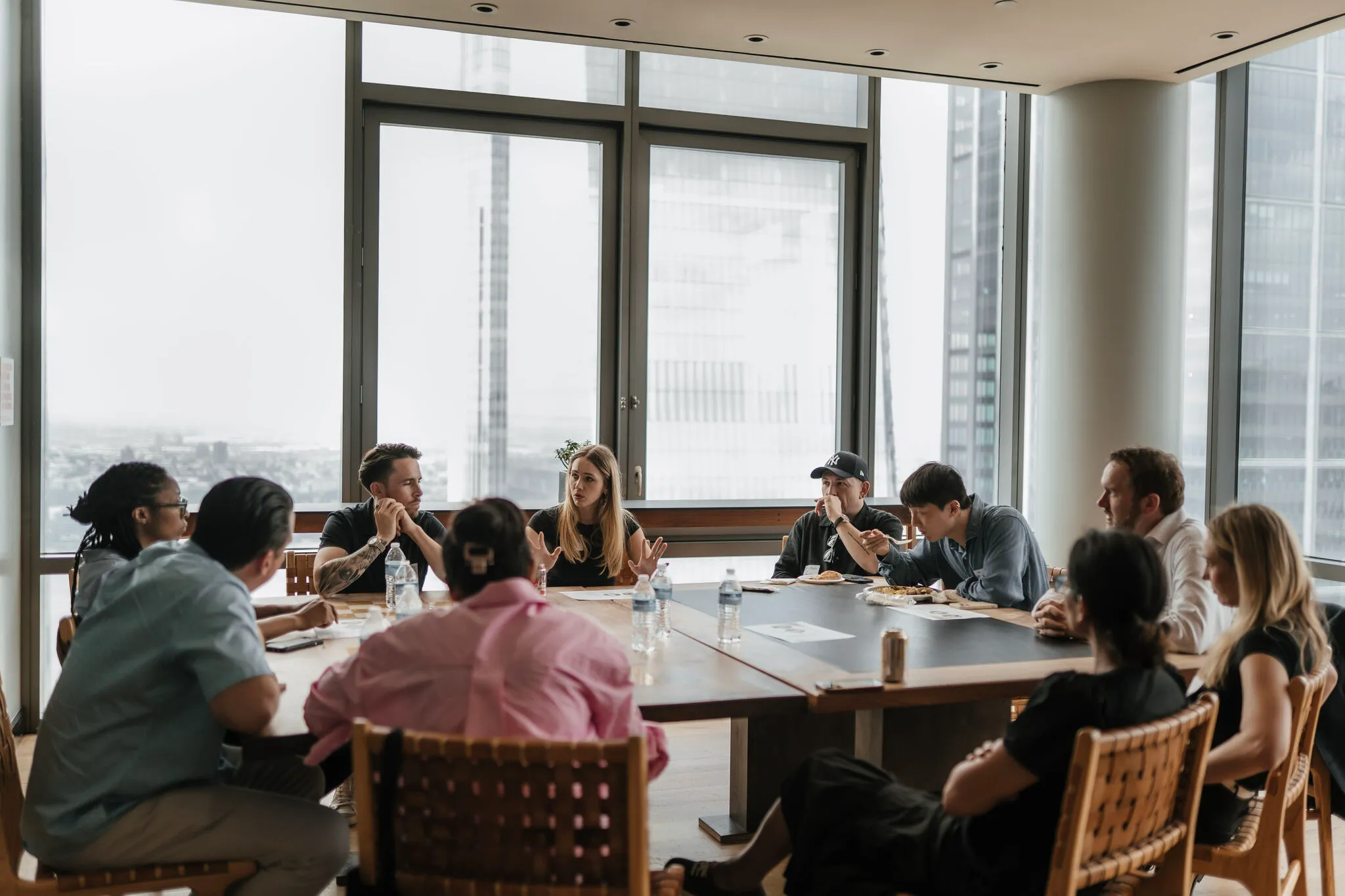 Attendees gathered around the table at an Alfa GTM Executive Roundtable